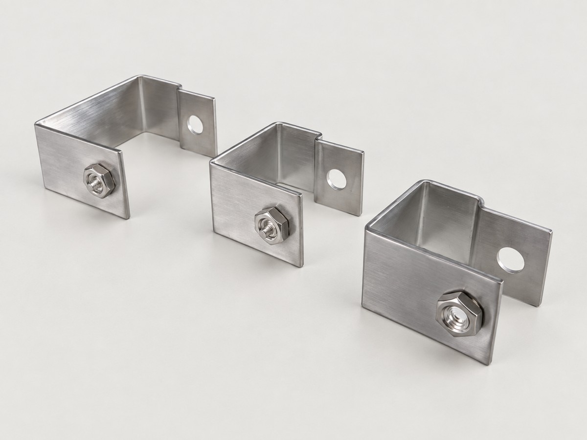 Three stainless steel grating clip brackets